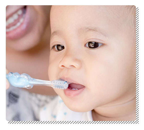 how to brush baby teeth
